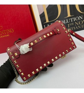 Valentino Small Rockstud Wristlet Clutch With Chain In Calfskin Burgundy