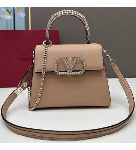 Mala torbu Valentino Vsling od krokodilske koÅ¾e i nakit vez od teleÄ‡e koÅ¾e boje Marelice